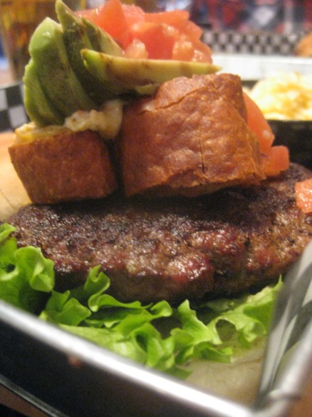 Not Yo' Burger:  fried tortilla, avocado, fire roasted cheese dip, a blend of diced ripe tomatoes & minced garlic. $13.34
